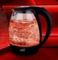 compact living glass and stainless steel kettle